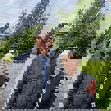 An elderly couple looking happy